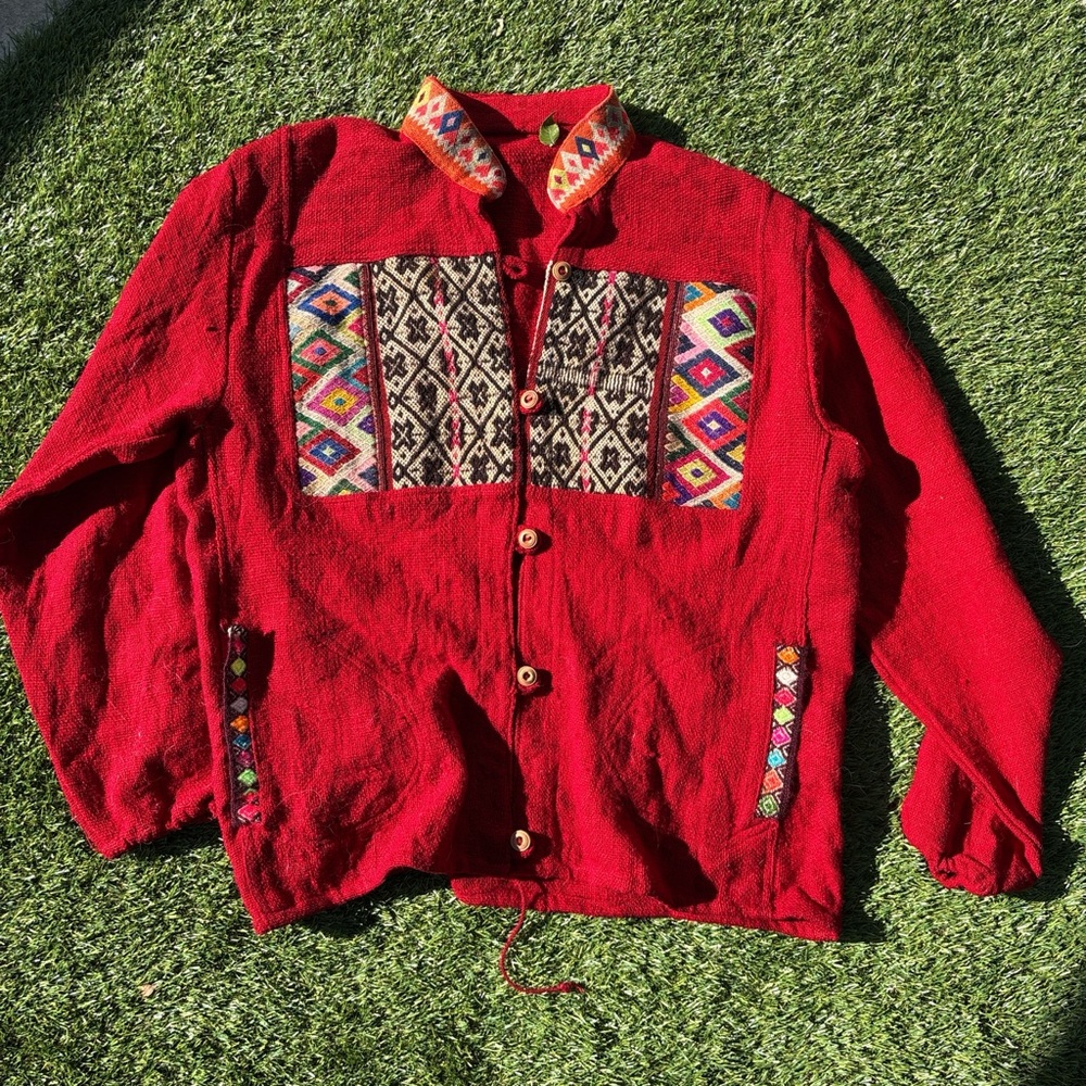 Guatemalan textile red embroidered jacket with colorful woven details